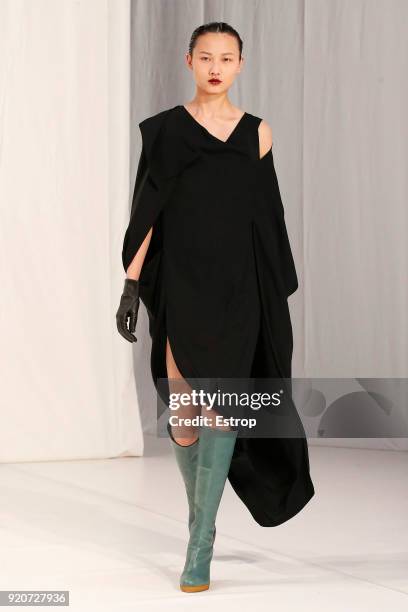 Model walks the runway at the Chalayan show during London Fashion Week February 2018 at Sadlers Wells Theatre on February 17, 2018 in London, England.