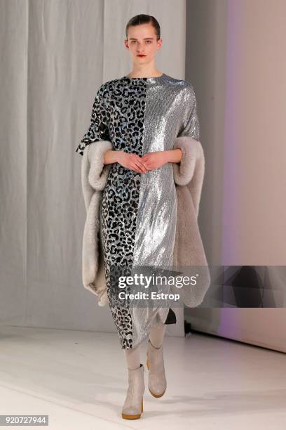 Model walks the runway at the Chalayan show during London Fashion Week February 2018 at Sadlers Wells Theatre on February 17, 2018 in London, England.