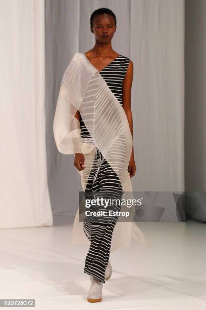 Model walks the runway at the Chalayan show during London Fashion Week February 2018 at Sadlers Wells Theatre on February 17, 2018 in London, England.