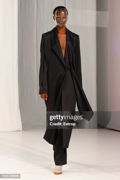 Model walks the runway at the Chalayan show during London Fashion Week February 2018 at Sadlers Wells Theatre on February 17, 2018 in London, England.