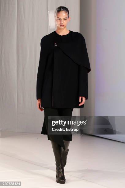 Model walks the runway at the Chalayan show during London Fashion Week February 2018 at Sadlers Wells Theatre on February 17, 2018 in London, England.