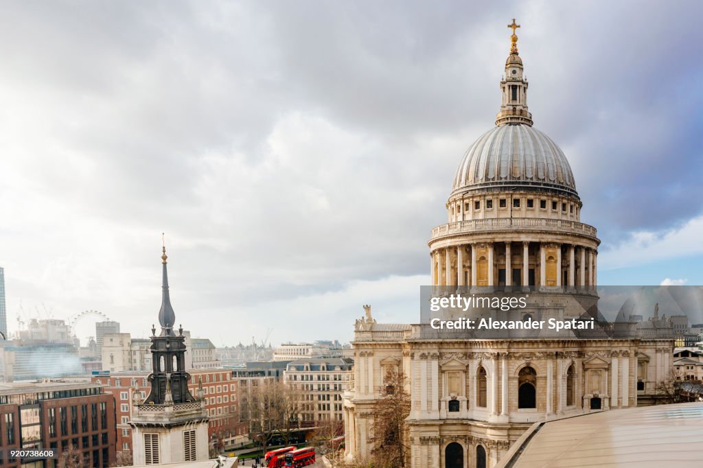 London skyline with dome of St Paul's cathedral on a cloudy day