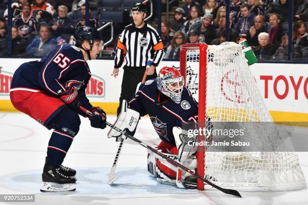 Markus Nutivaara of the Columbus Blue Jackets and goaltender Sergei Bobrovsky of the Columbus Blue Jackets defend the net against the Philadelphia...