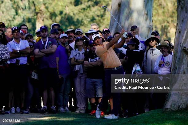 Sam Saunders hits from the gallery on the 13th Hole during the third round of the Genesis Open at the Riviera Country Club Golf Course on February...