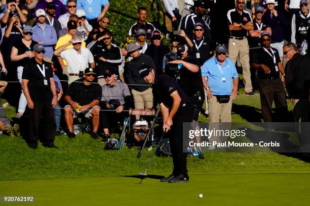 Patrick Cantlay hits his birdie putt on the 18th Hole during the third round of the Genesis Open at the Riviera Country Club Golf Course on February...