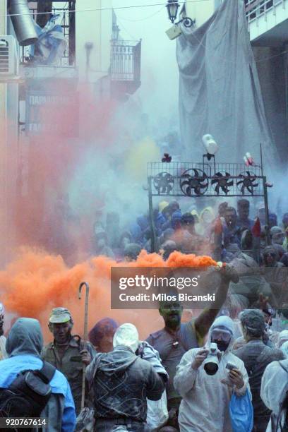 Local revellers celebrate 'Clean Monday' by throwing coloured flour at each other on February 19, 2018 in Galaxidi, Greece. Clean Monday, also known...