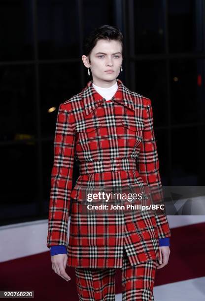 Model Lara Mullen walks the runway at the Emilia Wickstead show during London Fashion Week February 2018 at Great Portland Street on February 19,...