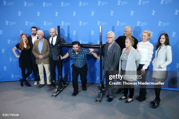 James Wilks , Germany's strongest man Patrik Baboumian , Joseph Pace , Louie Psihoyos and Dotsie Bausch pose with other cast members at the 'The Game...