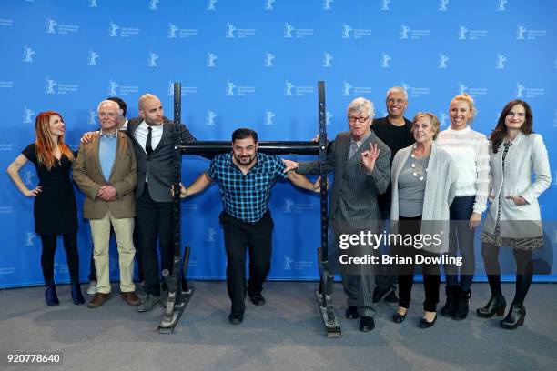 James Wilks , Germany's strongest man Patrik Baboumian , Joseph Pace , Louie Psihoyos and Dotsie Bausch pose with other cast members at the 'The Game...