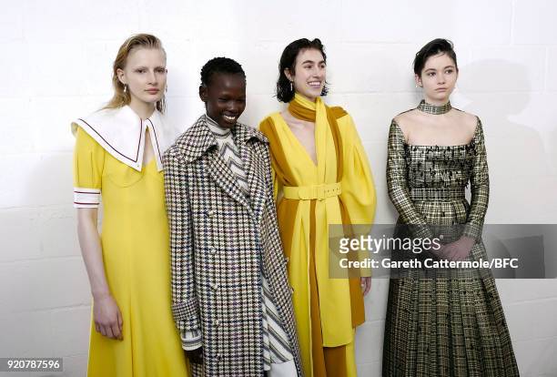Models backstage ahead of the Emilia Wickstead show during London Fashion Week February 2018 at Great Portland Street on February 19, 2018 in London,...