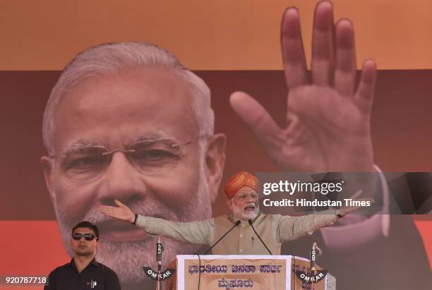 Prime Minister Narendra Modi addressing the rally during a political meet at Maharaja Ground ahead of state Assembly election on February 19, 2018 in...