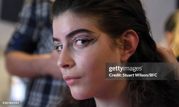 Models backstage ahead of the AV Robertson show during London Fashion Week February 2018 at St Andrews Church, Holborn on February 19, 2018 in...