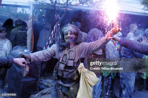 Local revellers celebrate 'Clean Monday' by throwing coloured flour at each other on February 19, 2018 in Galaxidi, Greece. Clean Monday, also known...