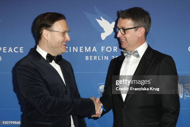 Jaka Bizilj and Gabor Steingart attend the Cinema For Peace Gala on the occasion of the 68th Berlinale International Film Festival at Hotel De Rome...