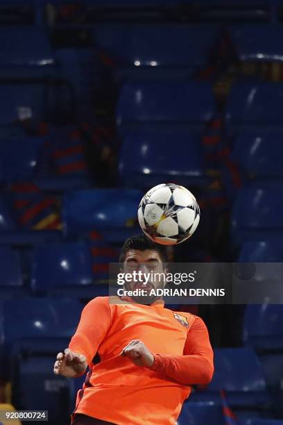 Barcelona's Uruguayan striker Luis Suarez takes part in a training session at Stamford Bridge stadium in London on February 19 on the eve of their...