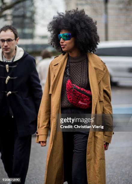 Julia Sarr Jamois wearing Supreme fanny bag seen outside Christopher Kane during London Fashion Week February 2018 on February 19, 2018 in London,...