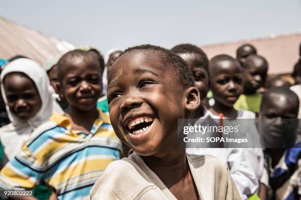 Young Ghanaian boy laughs in the remote village of Kpalong. Kpalong is 50kms outside Tamale in Northern Ghana. The Human Relief Foundation have built...