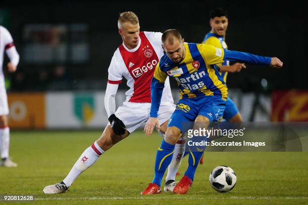 Mitchell Bakker of Ajax U23, Istvan Bakx of FC Oss during the Dutch Jupiler League match between Ajax U23 v FC Oss at the De Toekomst on February 19,...