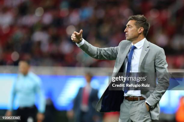 Diego Martin Alonso, coach of Pachuca gives instructions to his players during the 8th round match between Chivas and Pachuca as part of the Torneo...