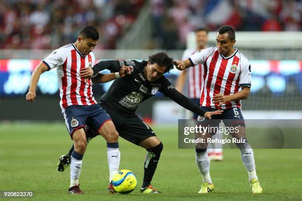 Orbelin Pineda of Chivas fights for the ball with Erick Gutierrez of Pachuca during the 8th round match between Chivas and Pachuca as part of the...