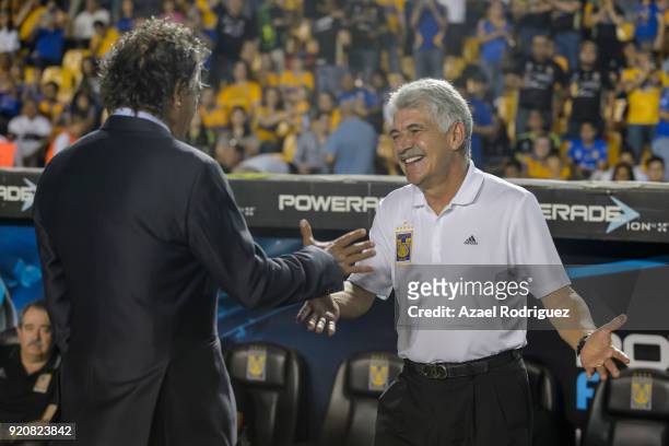 Ricardo Ferretti, coach of Tigres, shakes hands with Ruben Omar Romano, coach of Atlas, prior the 8th round match between Tigres UANL and Atlas as...