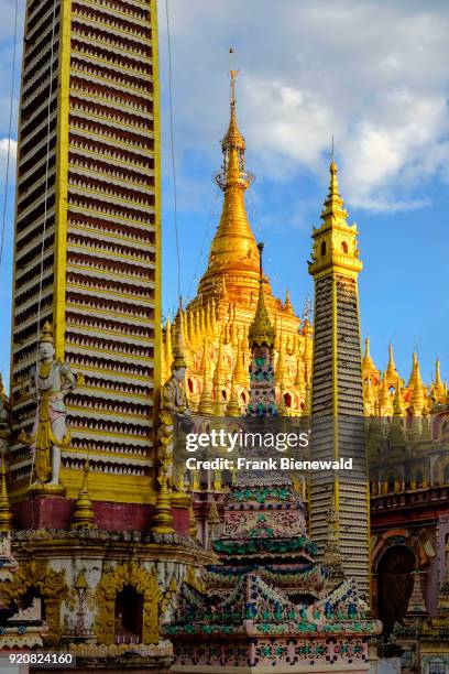 Detail of many fine small building structures and towers surrounding Thanboddhay Pagoda.