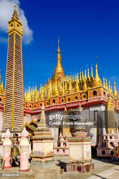 Detail of many fine small building structures and towers surrounding Thanboddhay Pagoda.