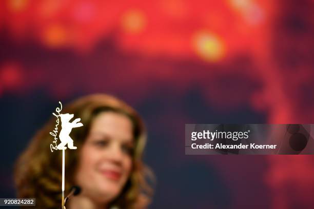 Marie Baeumer is seen behind a 'Berlinale Bear' at the '3 Days in Quiberon' press conference during the 68th Berlinale International Film Festival...