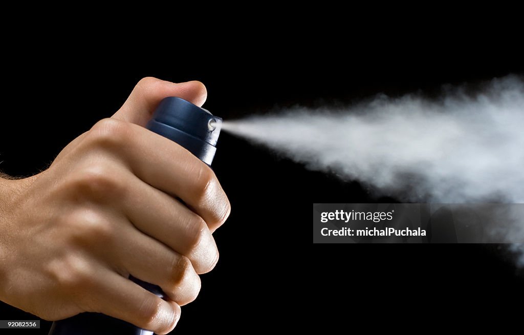 Spraying deodorant