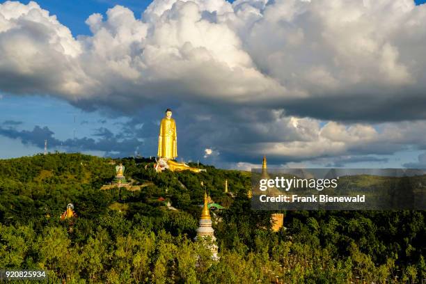 The Laykyun Sekkya Buddha and the Reclining Buddha statues are located on a hill in Maha Bodhi Ta Htaung near Khatakan Taung village.