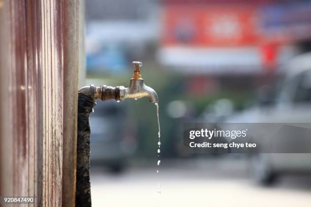 water wastage - water wastage stock pictures, royalty-free photos & images