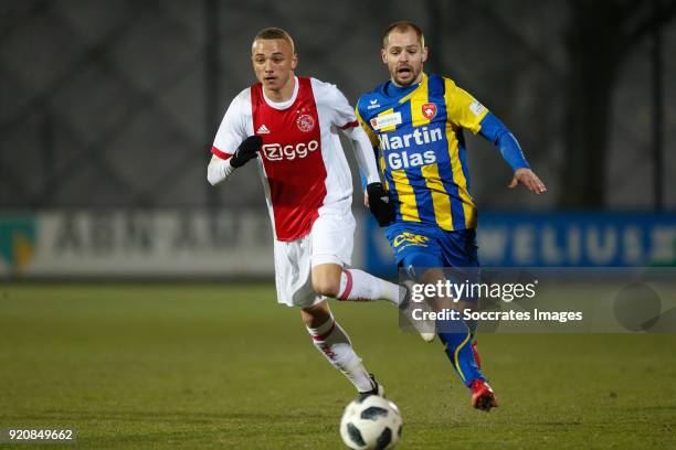 Noa Lang of Ajax U23, Istvan Bakx of FC Oss during the Dutch Jupiler League match between Ajax U23 v FC Oss at the De Toekomst on February 19, 2018...