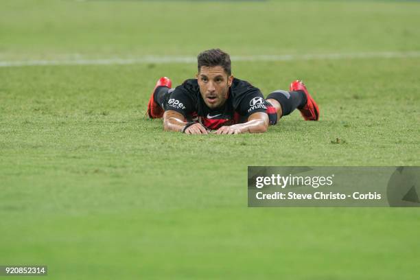 Alvaro Cejudo of the Wanderers lies on the ground after missing a scoring opportunity during the round one A-League match between the Western Sydney...