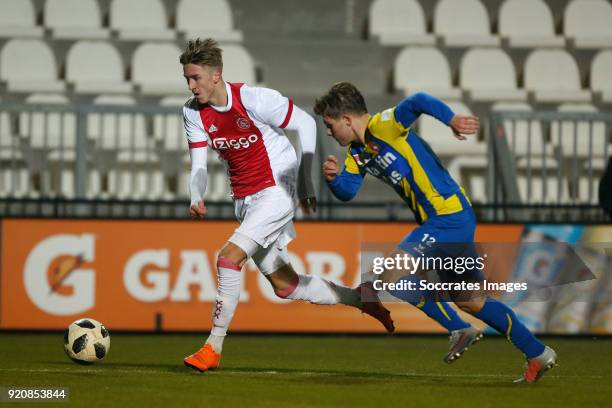 Dennis Johnsen of Ajax U23, Dean van der Sluys of FC Oss during the Dutch Jupiler League match between Ajax U23 v FC Oss at the De Toekomst on...