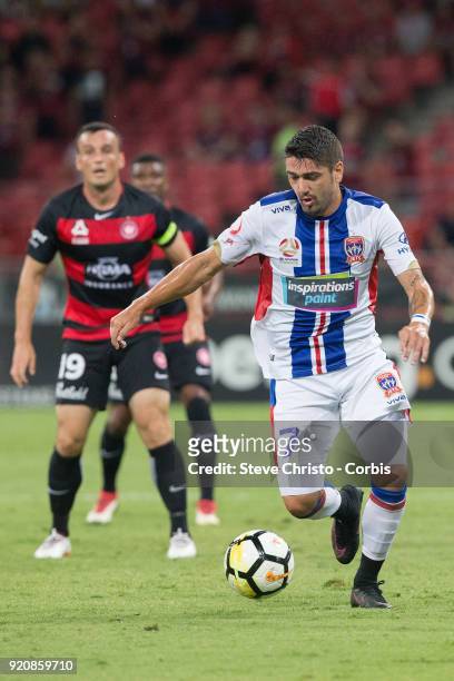 Dimitri Petratos of the Jets dribbles the ball during the round one A-League match between the Western Sydney Wanderers and the Newcastle Jets at...