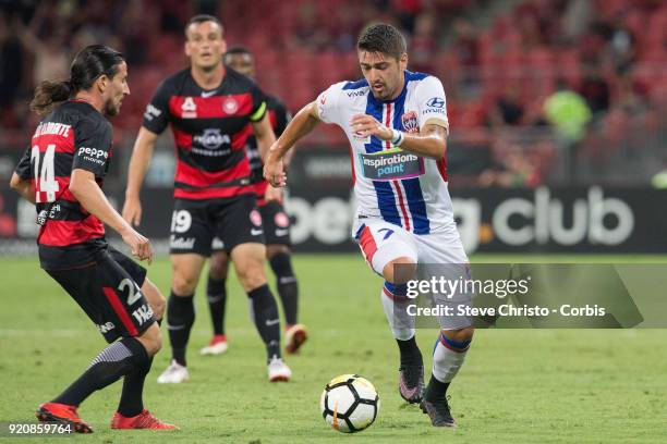 Dimitri Petratos of the Jets dribbles the ball during the round one A-League match between the Western Sydney Wanderers and the Newcastle Jets at...