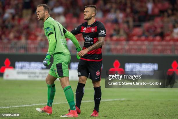 Jack Duncan of the Jets yells at teammates after a close call with Wanderers Josh Risdon during the round one A-League match between the Western...