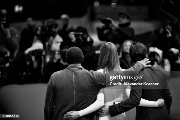 Jose Padilha, Rosamund Pike and Daniel Bruehl attend the '7 Days in Entebbe' premiere during the 68th Berlinale International Film Festival Berlin at...