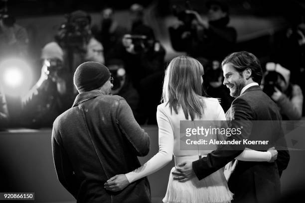 Jose Padilha, Rosamund Pike and Daniel Bruehl attend the '7 Days in Entebbe' premiere during the 68th Berlinale International Film Festival Berlin at...
