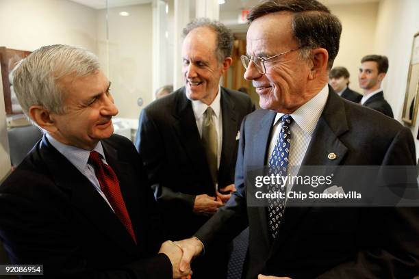 Senator Jack Reed , Sen. Ted Kaufman and Sen. Paul Kirk greet each other before a news conference about extending unemployment benefits at the U.S....