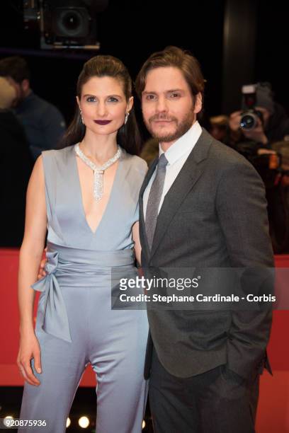 Daniel Bruehl and his girlfriend Felicitas Rombold attend the '7 Days in Entebbe' premiere during the 68th Berlinale International Film Festival...