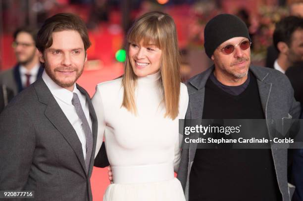 Daniel Bruehl, Rosamund Pike and Jose Padilha attend the '7 Days in Entebbe' premiere during the 68th Berlinale International Film Festival Berlin at...