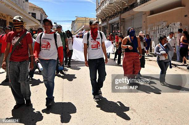 University students demonstrate in commemoration of the 65th anniversary of the Revolution that in 1944 overthrew dictator Jorge Ubico, at...