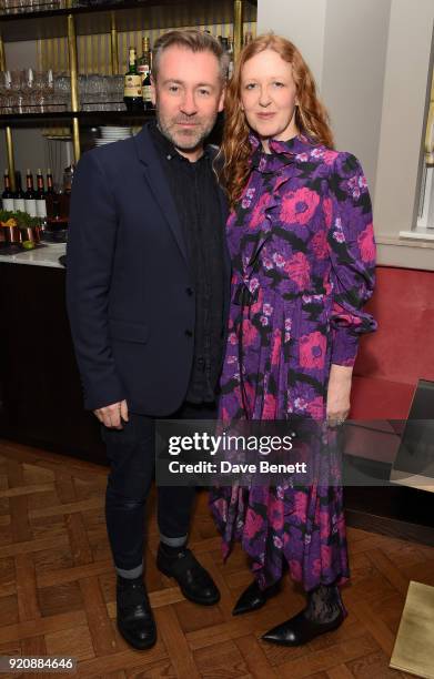 Justin Thornton and Thea Bregazzi attend a cocktail party in honour of Alison Loehnis' 10 year anniversary at NET-A-PORTER on February 19, 2018 in...