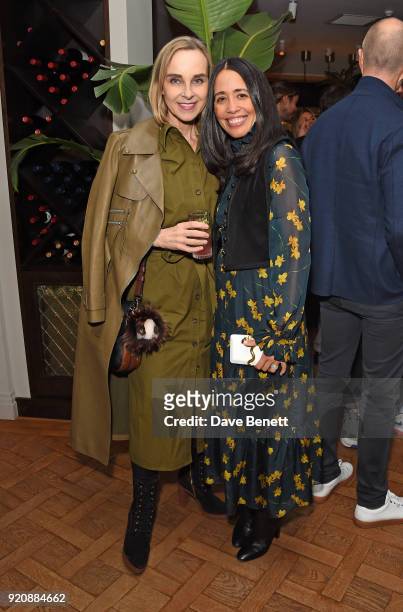 Guest and Carmen Borgonovo attend a cocktail party in honour of Alison Loehnis' 10 year anniversary at NET-A-PORTER on February 19, 2018 in London,...
