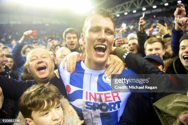 Dan Burn of Wigan Athletic celebrates after the Emirates FA Cup Fifth Round match between Wigan Athletic and Manchester City at DW Stadium on...