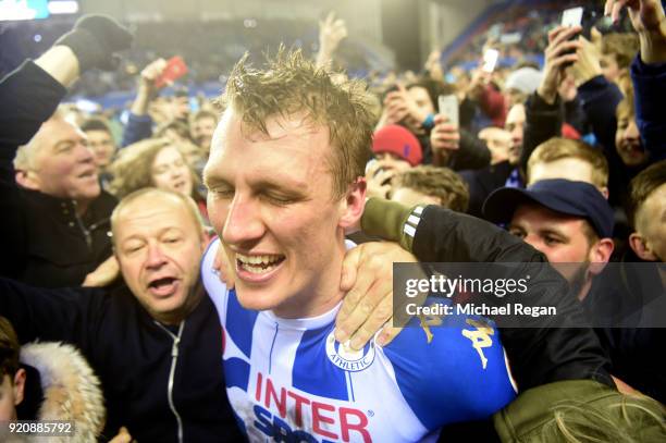 Dan Burn of Wigan Athletic celebrates after the Emirates FA Cup Fifth Round match between Wigan Athletic and Manchester City at DW Stadium on...