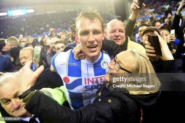 Dan Burn of Wigan Athletic celebrates after the Emirates FA Cup Fifth Round match between Wigan Athletic and Manchester City at DW Stadium on...