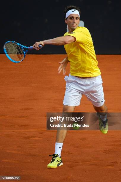 Albert Ramos Vinolas of Spain returns a shot to Rogerio Dutra Silva of Brazil during the ATP Rio Open 2018 at Jockey Club Brasileiro on February 19,...