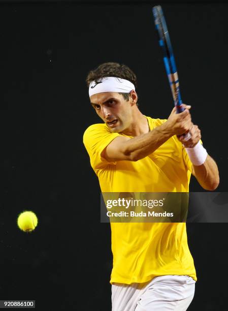 Albert Ramos Vinolas of Spain returns a shot to Rogerio Dutra Silva of Brazil during the ATP Rio Open 2018 at Jockey Club Brasileiro on February 19,...